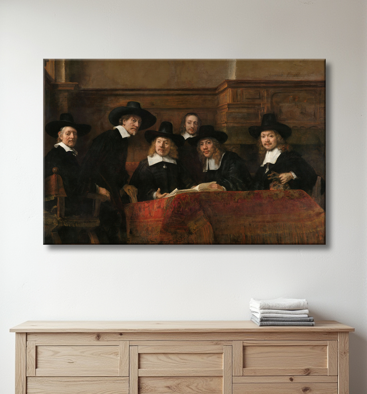Reproduction Les responsables de l'échantillonnage de la guilde des drapiers d'Amsterdam, connus sous le nom de « les syndics » de Rembrandt van Rijn avec decor