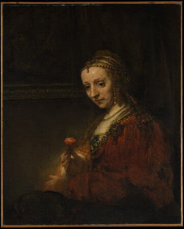 Poster fine art en France ou toile d’art imprimée. Femme avec une rose. Ce portrait de Rembrandt date des années 1660...